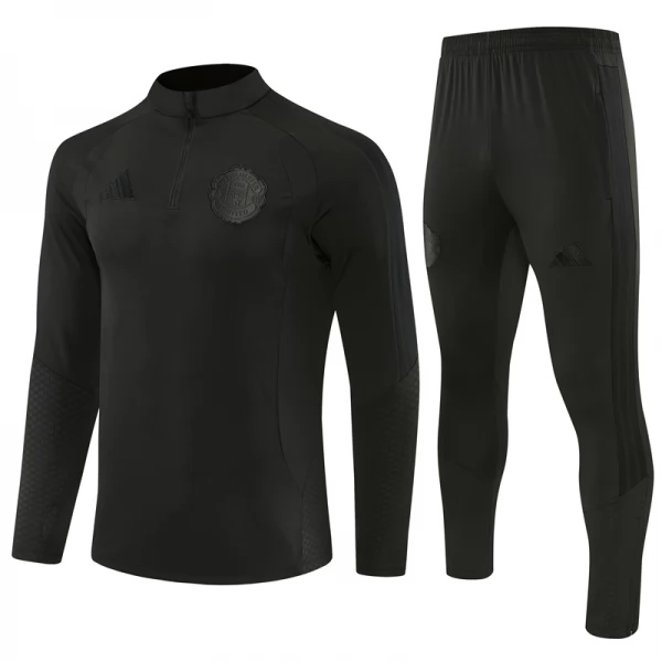 Survêtement Manchester United 2026/27 - 1-4 Zip Noir Survêtement Manchester United 2026/27 - 1-4 Zip Noir